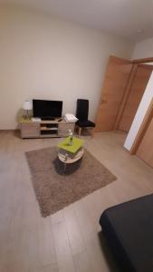 TV a/nebo společenská místnost v ubytování Casa la vino