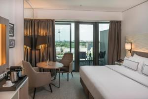 Cama ou camas em um quarto em Meliá Frankfurt City