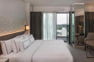 Cama ou camas em um quarto em Meliá Frankfurt City