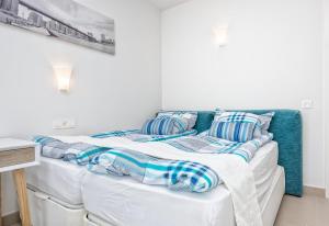 Posteľ alebo postele v izbe v ubytovaní New Luxury 3-bedroom Seaview Apt