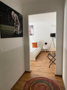 Postel nebo postele na pokoji v ubytování Hotel am Hafen