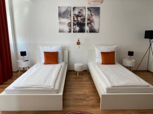 Postel nebo postele na pokoji v ubytování Hotel am Hafen