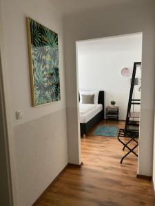 Postel nebo postele na pokoji v ubytování Hotel am Hafen