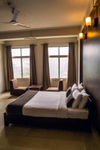 Cama o camas de una habitación en Hotel Ariel