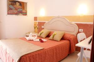 Posteľ alebo postele v izbe v ubytovaní 4Dreams Hotel Chimisay