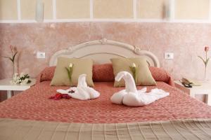 Posteľ alebo postele v izbe v ubytovaní 4Dreams Hotel Chimisay