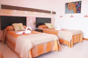 Posteľ alebo postele v izbe v ubytovaní 4Dreams Hotel Chimisay