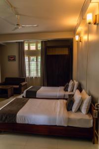 Katil atau katil-katil dalam bilik di Hotel Ariel