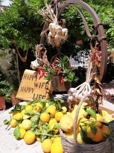 a bunch of lemons in baskets on a table at Al Chiaro di Luna in Agerola
