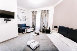 Telewizja i/lub zestaw kina domowego w obiekcie Wanderlust Relais Vaticano