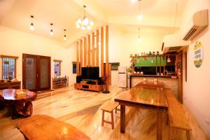 TV a/nebo společenská místnost v ubytování 鄉間雅築休閒民宿Country Villa Homestay