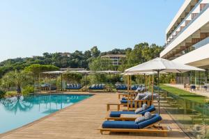 The swimming pool at or close to Golden Tulip Porto-Vecchio