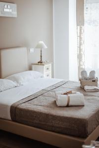 Łóżko lub łóżka w pokoju w obiekcie Wanderlust Relais Vaticano