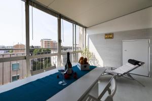 Posedenie v ubytovaní La Veranda - Bright Top Floor apartment with views of the Madonnina