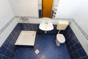 Kúpeľňa v ubytovaní Apartmani Vranjes