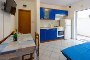 Kuchyňa alebo kuchynka v ubytovaní Apartmani Vranjes