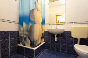 Kúpeľňa v ubytovaní Apartmani Vranjes