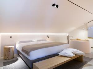 Postel nebo postele na pokoji v ubytování Criu Boutique Hotel