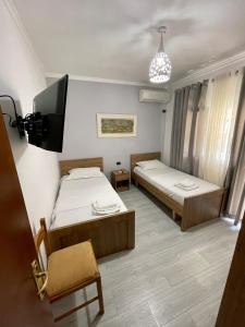 Postel nebo postele na pokoji v ubytování Hotel Osumi