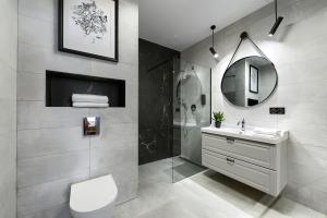 Elite Apartament IMPERO z Parkingiem tesisinde bir banyo