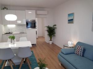 Kuchyňa alebo kuchynka v ubytovaní Marina Rijeka Center apartments