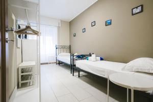 Ένα ή περισσότερα κρεβάτια σε δωμάτιο στο Grab a Flat in Coroneo