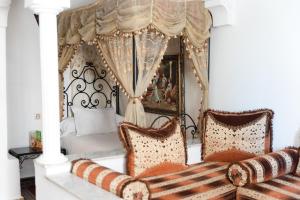 Un ou plusieurs lits dans un hébergement de l'établissement Hotel Moroccan House Casablanca