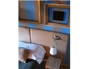 TV a/nebo společenská místnost v ubytování Residenza Navona Verona