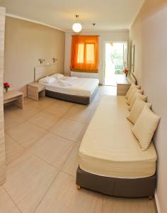Postel nebo postele na pokoji v ubytování Hotel Stella