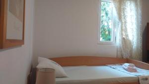 Postel nebo postele na pokoji v ubytování Apartman Vesna