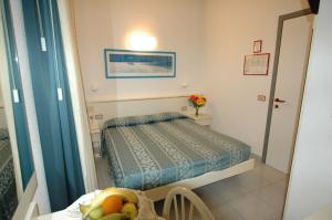 Voodi või voodid majutusasutuse Hotel Crystal toas