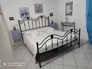 Casa Vacanza Della Malva 14にあるベッド