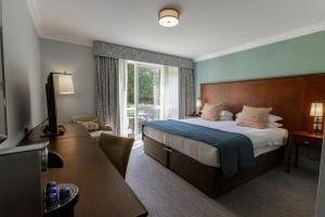 Postel nebo postele na pokoji v ubytování Bush Hotel Farnham + 37 fotografií