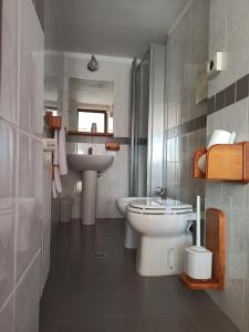 Koupelna v ubytování Albergo Miravalle