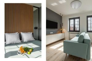 Cet appartement comprend une chambre et un salon avec un lit et une télévision. dans l'établissement BY THE RIVER apartments, à Gdańsk