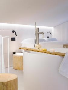 Kuchyň nebo kuchyňský kout v ubytování Criu Boutique Hotel