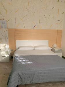 Letto o letti in una camera di Albergo Moderno