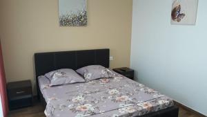 Ένα ή περισσότερα κρεβάτια σε δωμάτιο στο CASA ROXANA