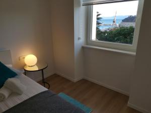 Posteľ alebo postele v izbe v ubytovaní Marina Rijeka Center apartments