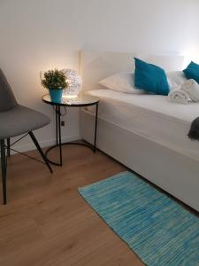 Posteľ alebo postele v izbe v ubytovaní Marina Rijeka Center apartments