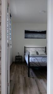 Postel nebo postele na pokoji v ubytování Apartman Alisa