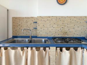 Küche/Küchenzeile in der Unterkunft Giardini Beach loft