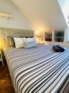 Łóżko lub łóżka w pokoju w obiekcie My Citymad Stay Madrid