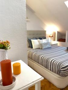 Łóżko lub łóżka w pokoju w obiekcie My Citymad Stay Madrid