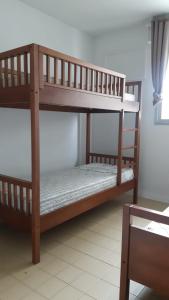 Postel nebo postele na pokoji v ubytování Guarujá - Praia das Asturias Beira-Mar