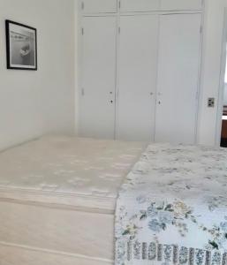 Postel nebo postele na pokoji v ubytování Guarujá - Praia das Asturias Beira-Mar