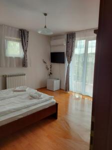 Postel nebo postele na pokoji v ubytování Casa Eric