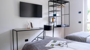 Postel nebo postele na pokoji v ubytování Agritur Deromedi