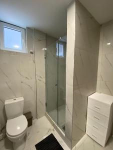 Koupelna v ubytování JOX Apartment