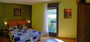 Ένα ή περισσότερα κρεβάτια σε δωμάτιο στο Casa Rural La Campana Con o sin Ático